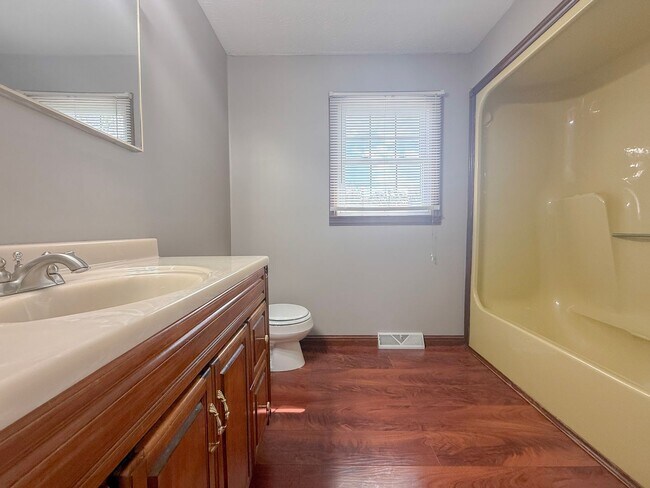 Building Photo - Spacious 3-Bedroom Home with Huge Yard, Covered Porches & Storage Building