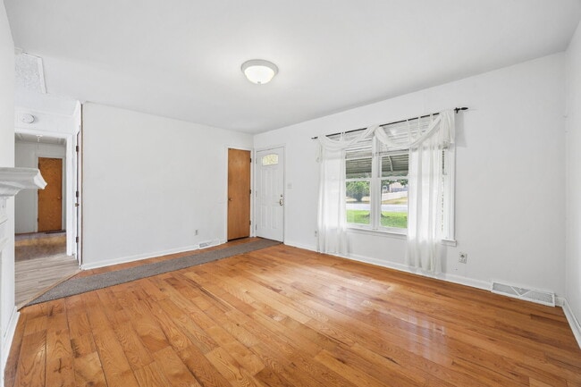 Building Photo - Classic Brick Ranch with 24x24 Workshop, Fenced Yard & Garden Beds