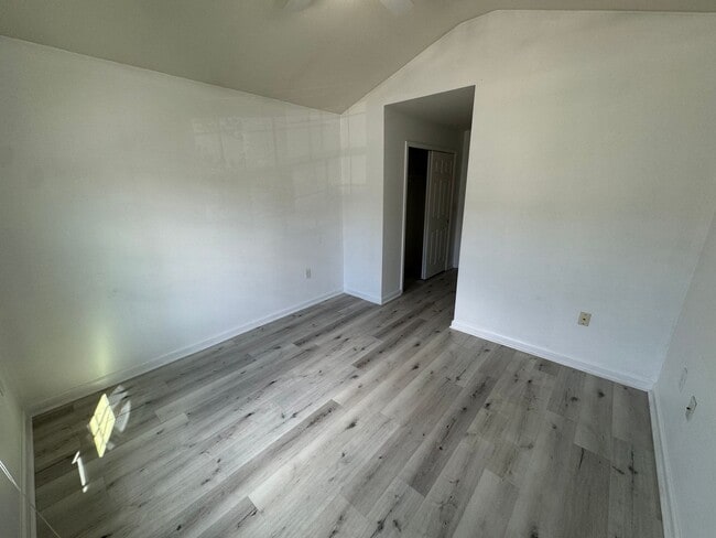 Building Photo - Lake Views. Upgraded Finishes. Gated Commu...