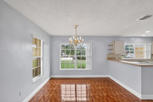 Building Photo - 14912 White Magnolia Ct