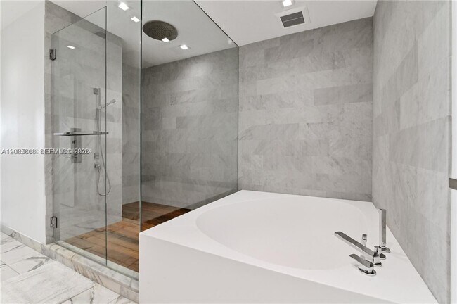 Building Photo - 10203 Collins Ave