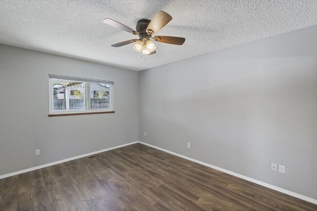 Building Photo - Spacious 4-Bedroom Home with Finished Basement, Large Deck & 2-Car Garage