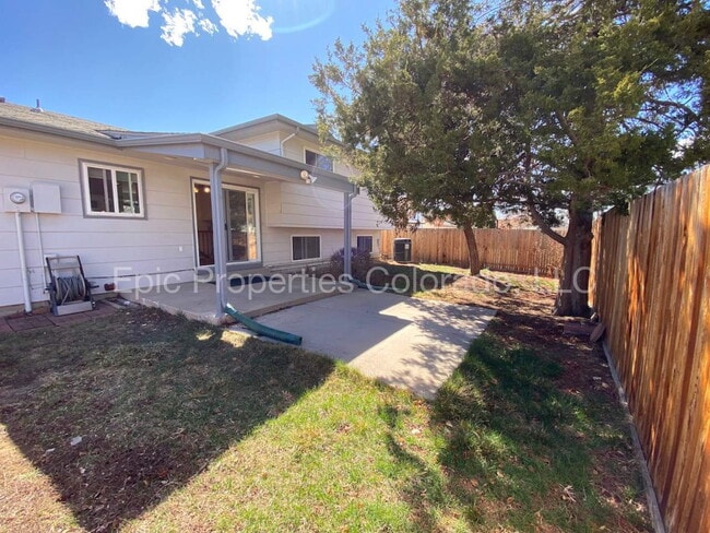 Building Photo - Pet-friendly Tri-Level Home with Large Backyard