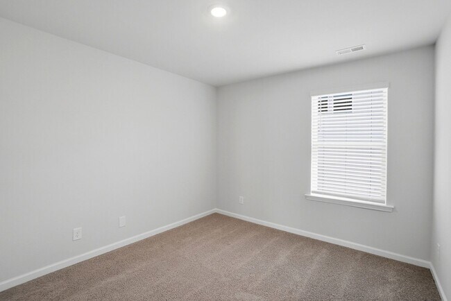 Building Photo - 4BR Home in The Pines at Paw Creek – New Construction + Private Deck