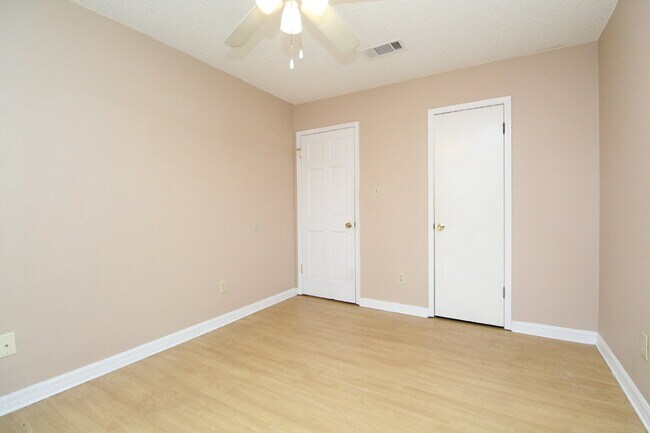 Building Photo - 2BR Home with Wood-Look Flooring, Fenced Backyard & Private Patio