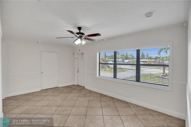 Building Photo - 450 NE 58th Ct
