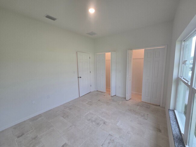 Building Photo - Brand New 2/2/1- SW Lehigh Acres