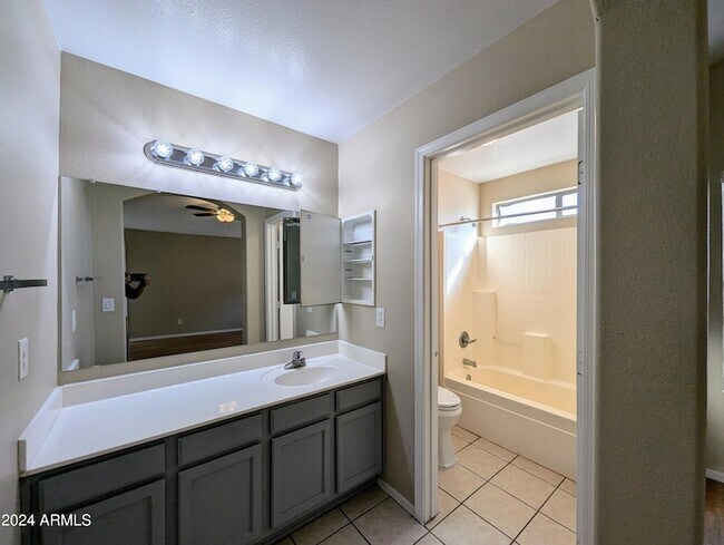 Building Photo - 7059 W Gardenia Ave