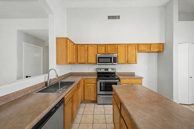 Building Photo - 7043 W Phelps Rd