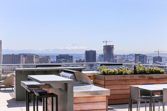 Building Photo - Spacious NW-Facing 1 Bed + Den, 1 Bath Luxury High-Rise Condo in Seattle's Denny Triangle – Nexus