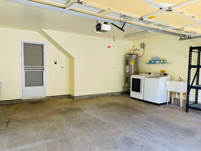 Building Photo - Partly Furnished 3-bedroom, 2.5-bath home,...