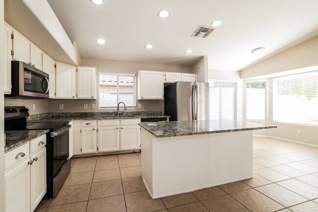 Building Photo - 6925 E Laguna Azul Ave