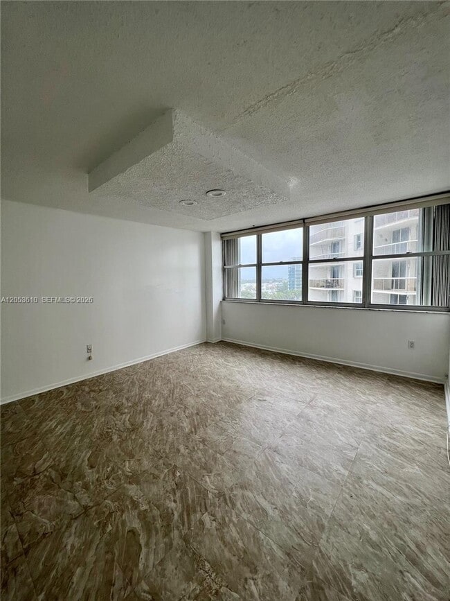 Building Photo - 5838 Collins Ave