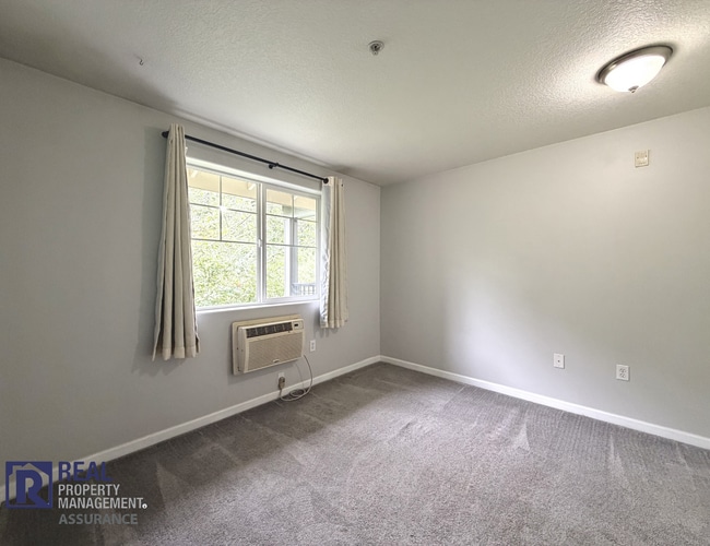 Building Photo - Tanasbourne 2BR/2BA Condo | Balcony, A/C & Covered Parking