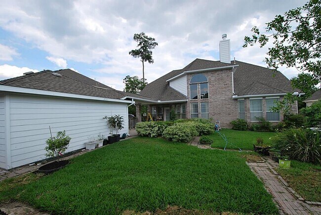 Building Photo - 9106 Memorial Pines Way