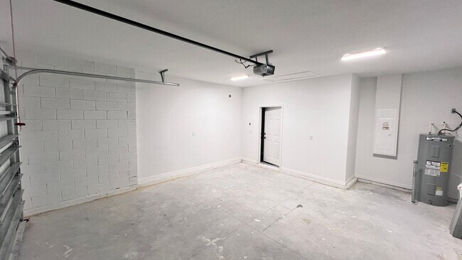 Building Photo - Spacious 3-Bedroom Home with Garage & Pati...