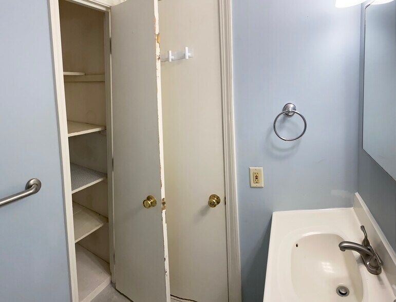 Bathroom closet - 23 Spencer Rd