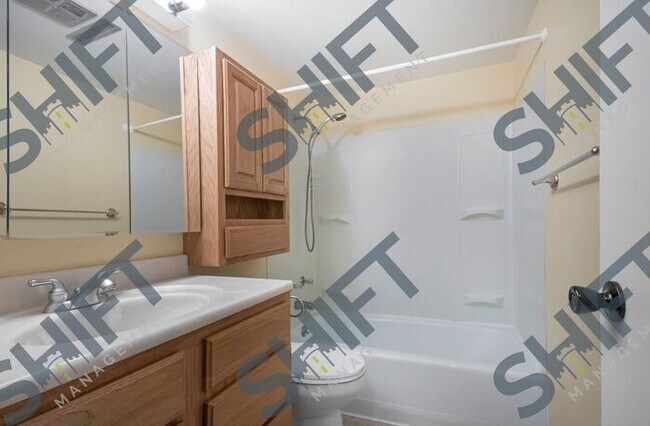 Building Photo - 5671 Christie Ave - Gorgeous 4 Bed