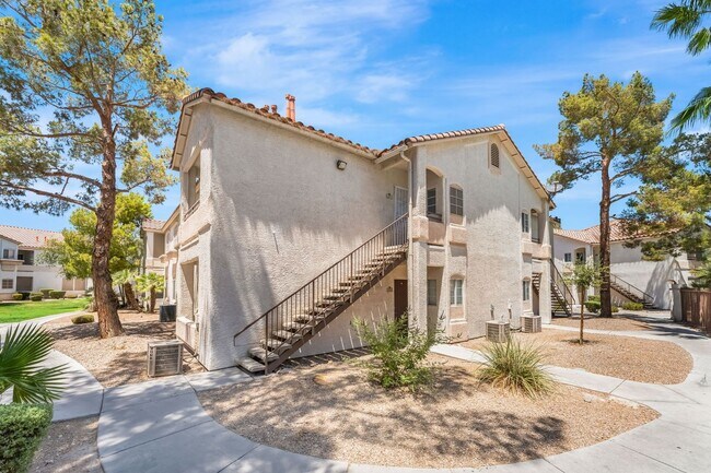 Building Photo - Modern Gated Condo with Stylish Upgrades, Poolside Location & Private Balcony!