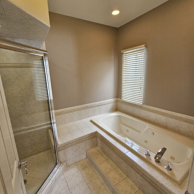 Building Photo - 3 Bedroom, 3.5 Bath Ranch with Open Floor Plan, Finished Basement & Scenic Pond Views