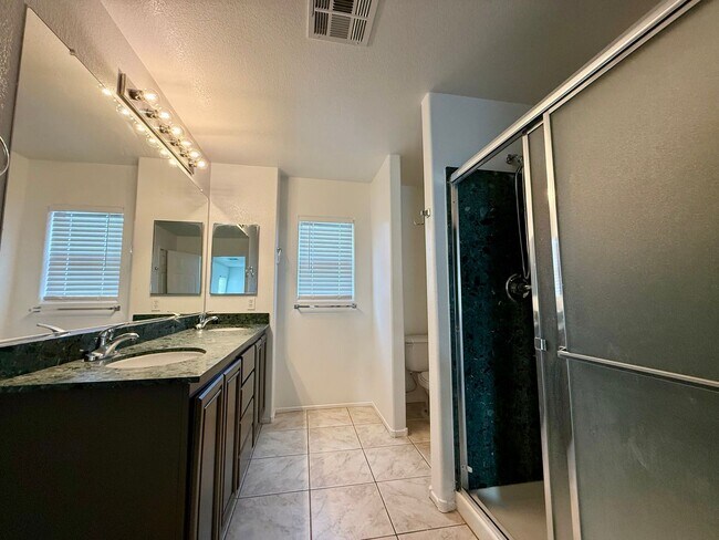 Building Photo - COMING SOON 5/BD 3/BA Home W/ Expansive Yard, Solar Panels, and No Rear Neighbors!