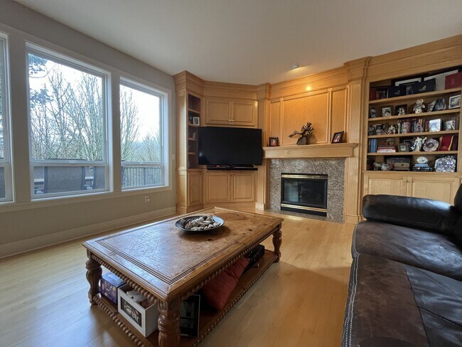 Building Photo - Executive-Style Northwest Heights Home with Forest Views and Refined Architectural Details