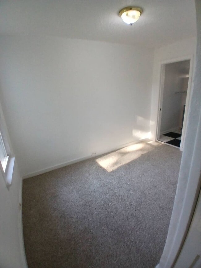 Building Photo - Newly Renovated 4BR/1BA Single-Family Home with Garage – Cleveland