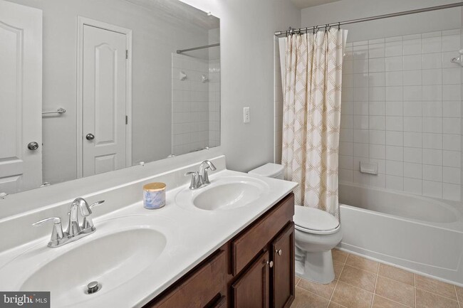 Building Photo - 7530 Stonehouse Run Dr