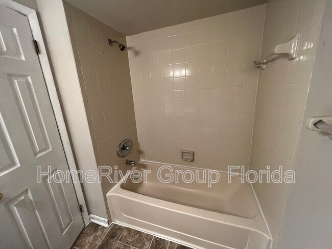 Building Photo - 8745 Whispering Pines Dr