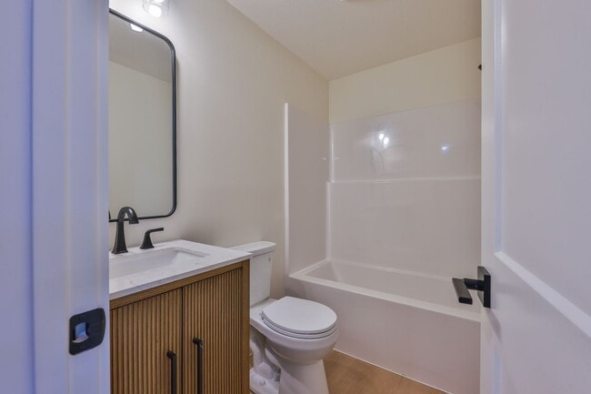 Building Photo - Modern Remodel with Designer Finishes | All Utilities Included