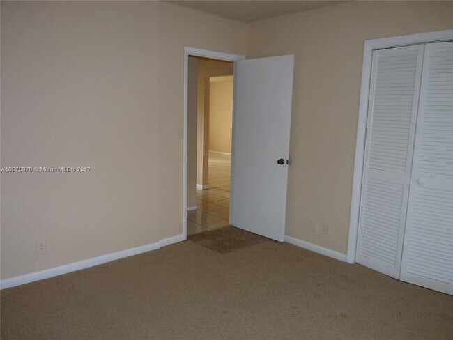 Building Photo - 3100 Coral Springs Dr