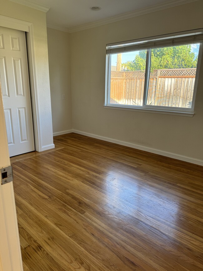 Bedroom 2 looking into backyard - 1533 Santa Monica Ave