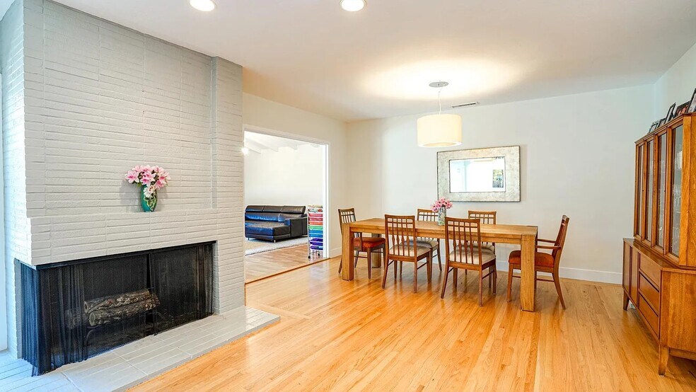 Dining area with wood burning fireplace - 1415 Butterfield Rd