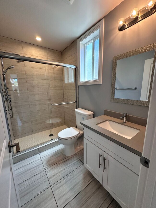 Building Photo - Attached separate first floor 1-bedroom, 1-bathroom suite