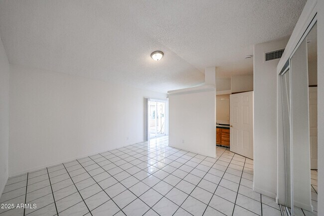 Building Photo - 3408 W Port Au Prince Ln