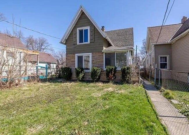 Building Photo - Newly Renovated 4BR/1BA Single-Family Home with Garage – Cleveland