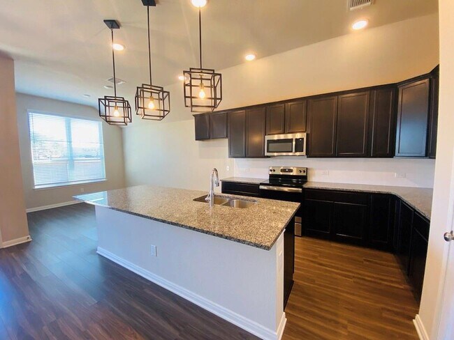 Building Photo - 5205 Leaning Tree