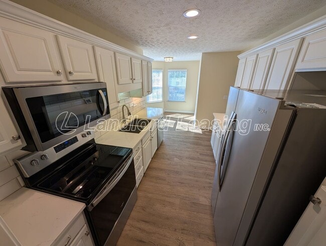 Building Photo - French Creek Reserve Condo with Vaulted Ceilings & Skylights