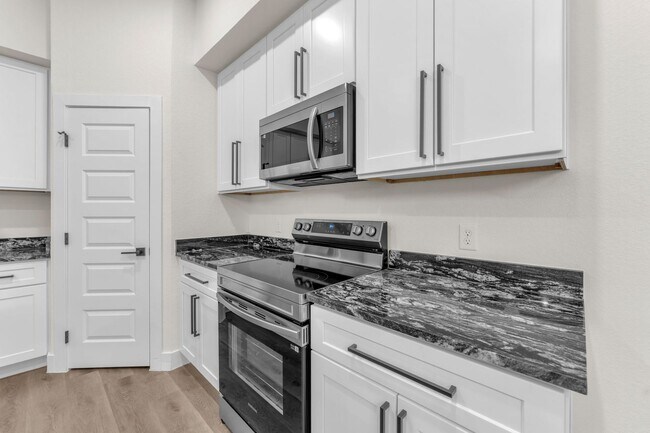 Building Photo - All Units Are Available With Brandnew Full Appliance Package