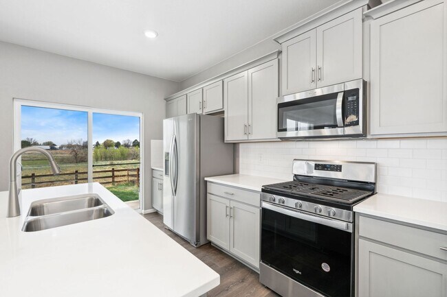 Building Photo - LOOK AND LEASE: MAY RENT FREE Spacious 4BD...