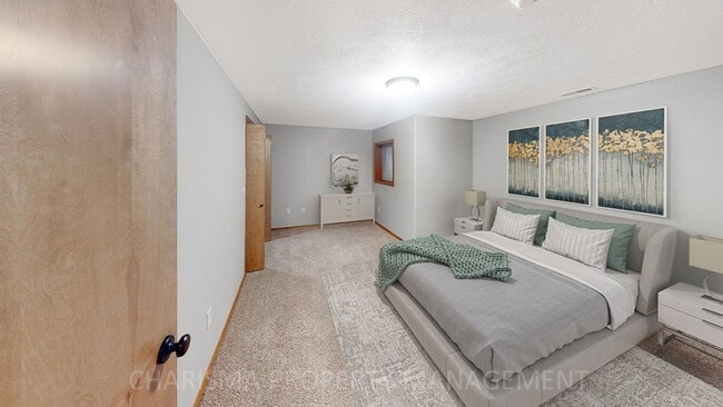 Building Photo - 3 BD, 2.5 BA TOWNHOME, DOUBLE ATTACHED GARAGE, PET FRIENDLY, WALK OUT DECK, LOTS OF SPACE!