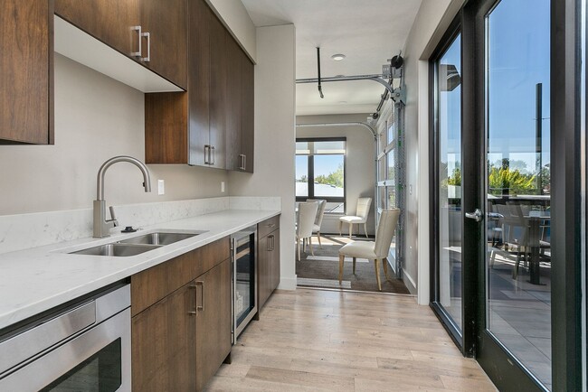 Building Photo - COME HOME TO REFINED DOWNTOWN LUXURY CONDO...
