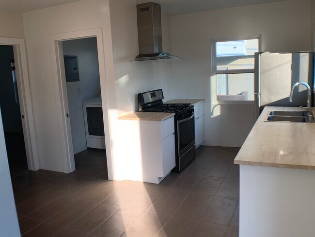 Kitchen and Laundry room - 1312 S Victoria Ave
