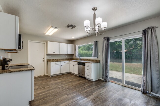 Building Photo - 9415 Quicksilver Dr