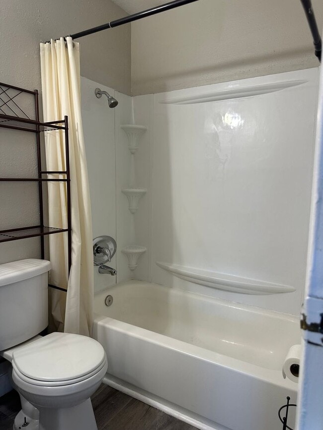 Building Photo - Three bedroom townhome with 2 car garage a...