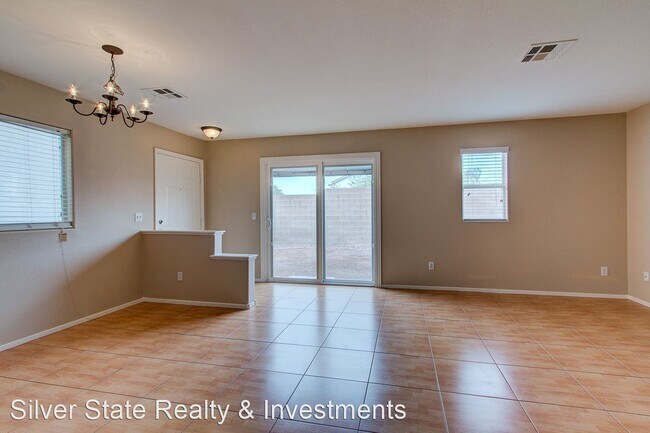 Building Photo - 2 br, 2.5 bath House - 6578 MARILYN MONROE...