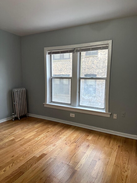 Building Photo - 5666 N Ridge Ave