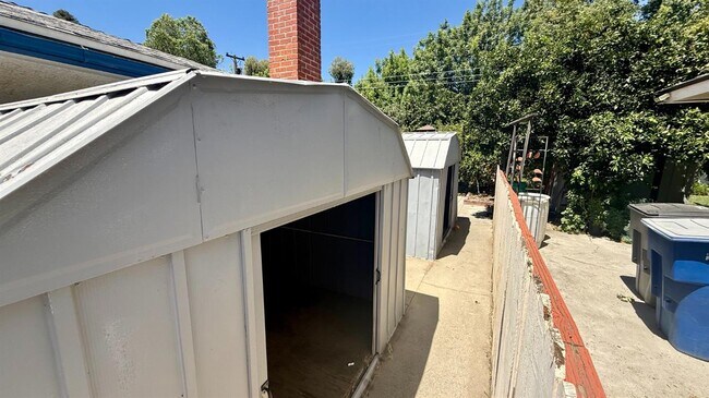 Building Photo - 4829 E Santa Ana Ave