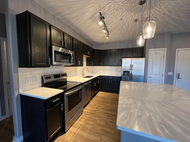 Building Photo - Incredible First Floor Corner 2bd/2ba Loft at Via Varra! AVAILABLE 7/1!