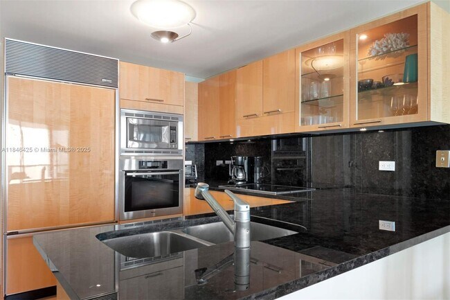 Building Photo - 6799 Collins Ave